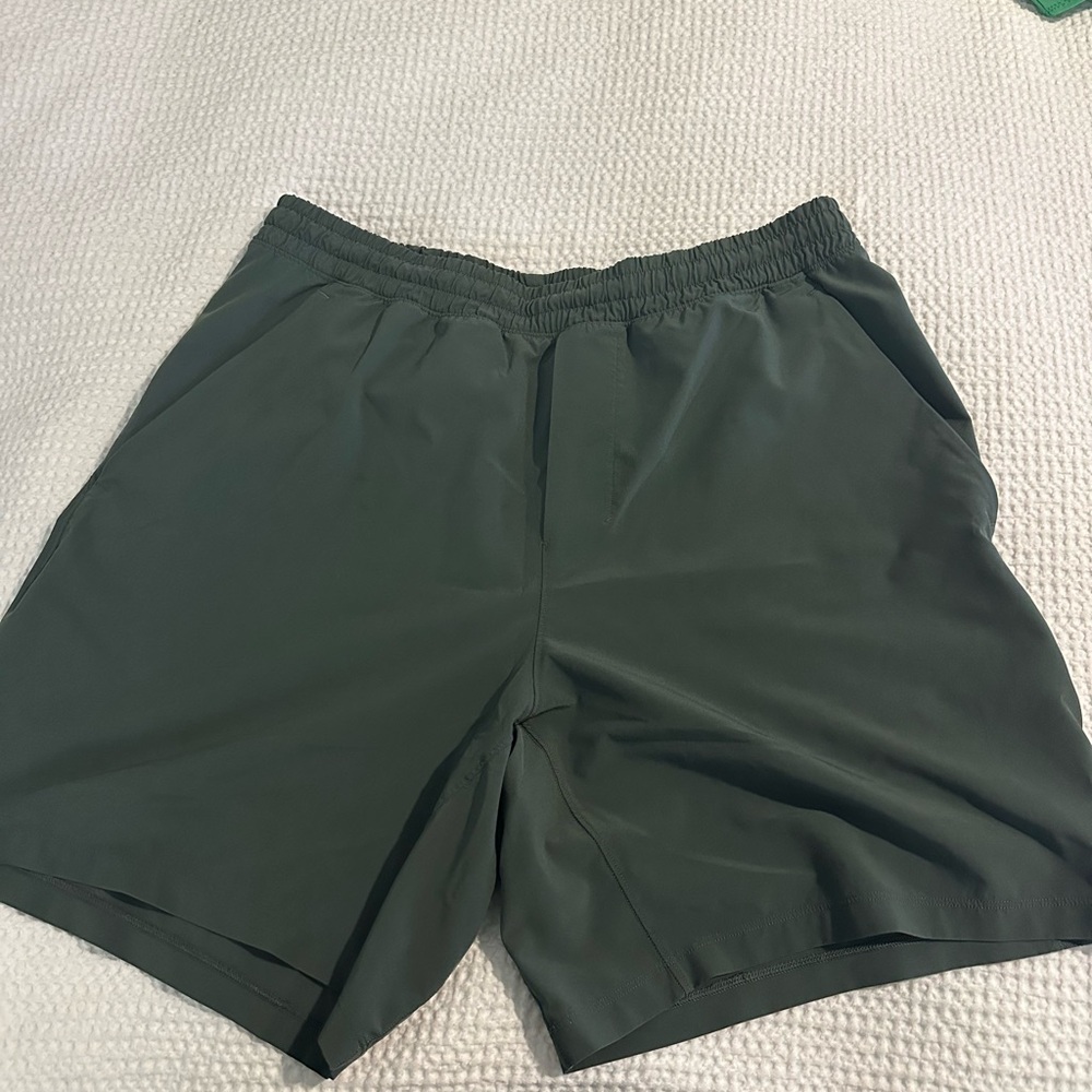 lululemon athletica 7" Men's Pace Breaker shorts in Deep Green